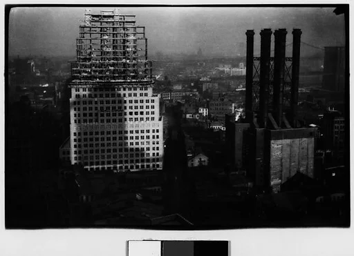 [High-Rise Building Under Construction and Smokestacks, New York City]