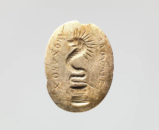 Carnelian intaglio: Lion-headed serpent