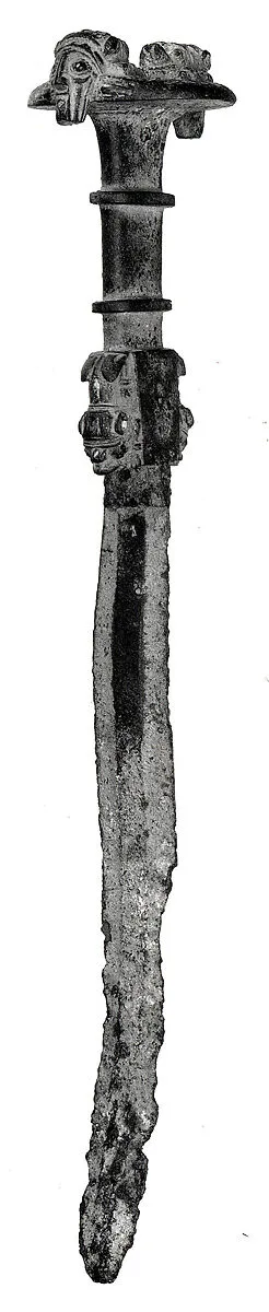 Sword with figures on handle — Unknown