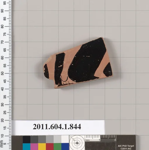 Terracotta fragment of a kylix (drinking cup)