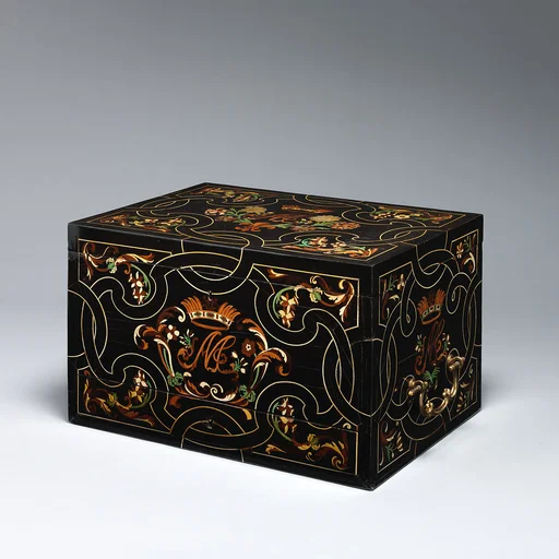 Coffer with inlaid monogram