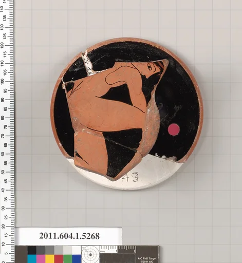Terracotta fragment of a kylix (drinking cup)