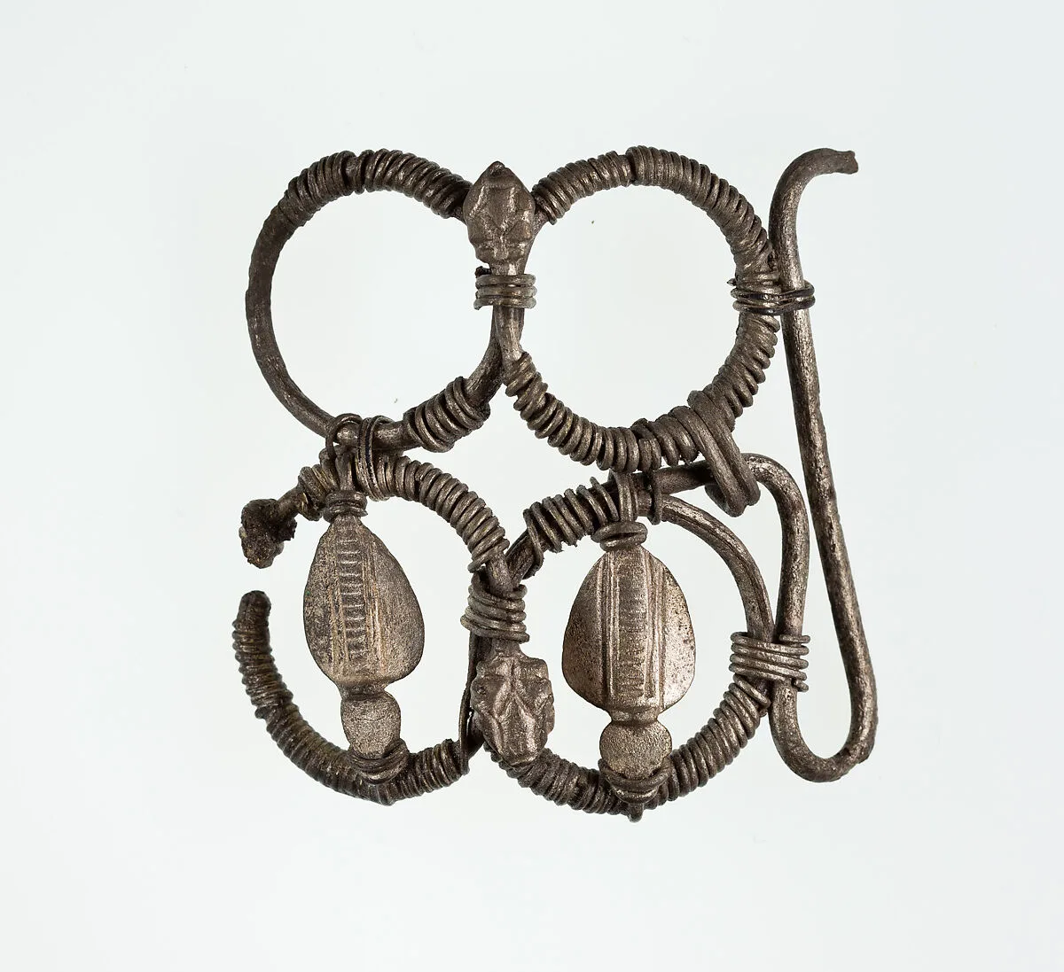 Part (?) of a bracelet or armlet with uraei — Unknown