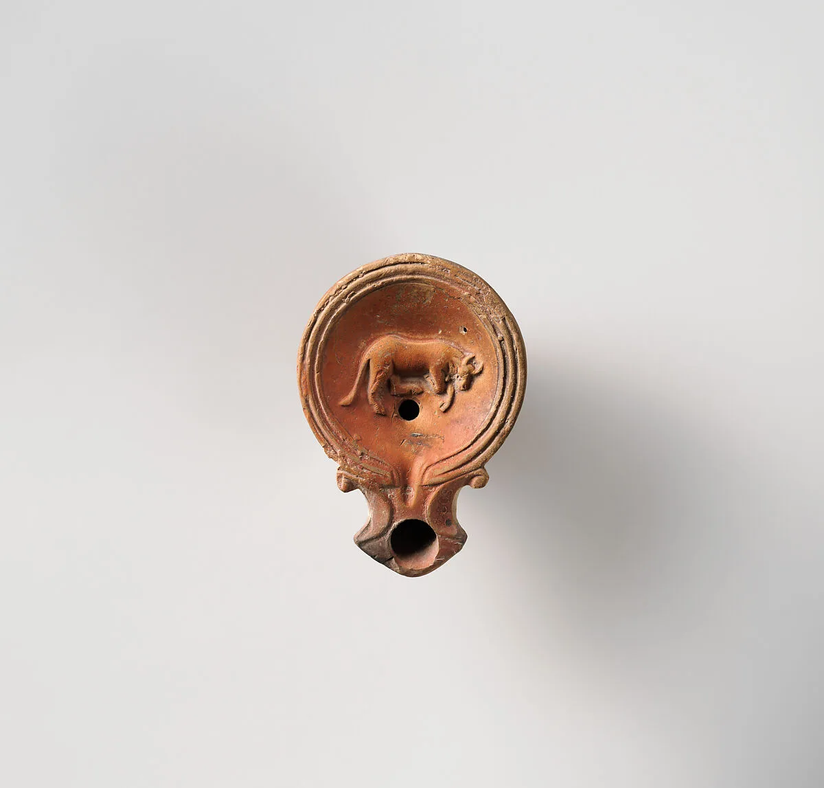 Terracotta oil lamp — Unknown