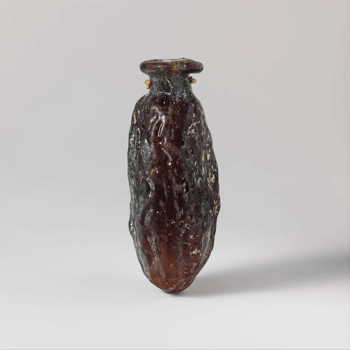 Glass bottle shaped like a date — Unknown