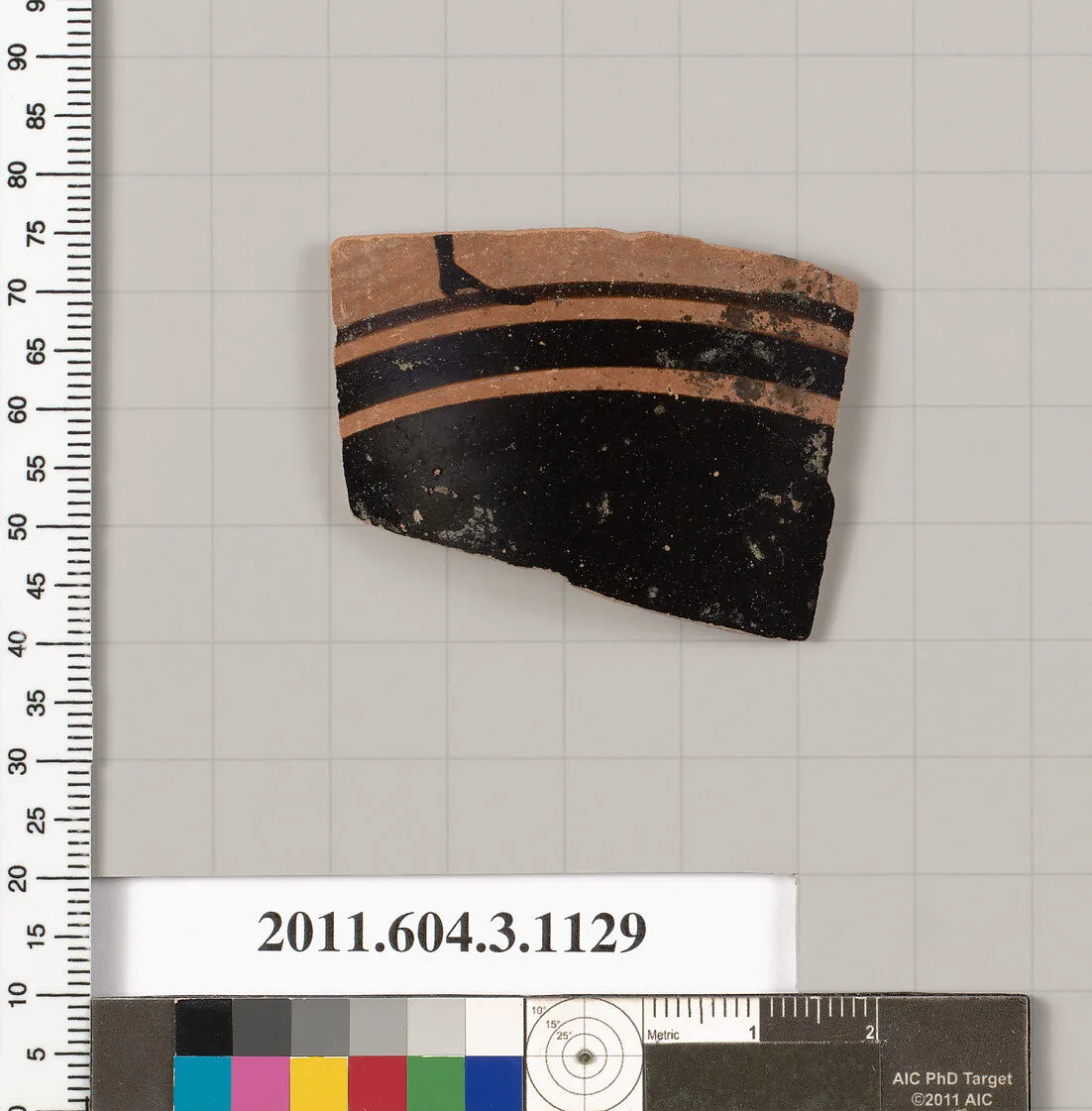 Terracotta fragment of a mastoid (drinking cup with narrow base) or a kyathos (cup-shaped ladle) — Unknown