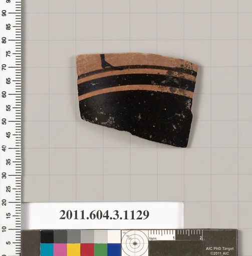 Terracotta fragment of a mastoid (drinking cup with narrow base) or a kyathos (cup-shaped ladle)