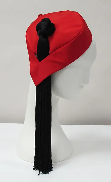 Cap — Charles James