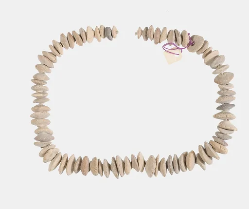 Necklace of white lenticular beads