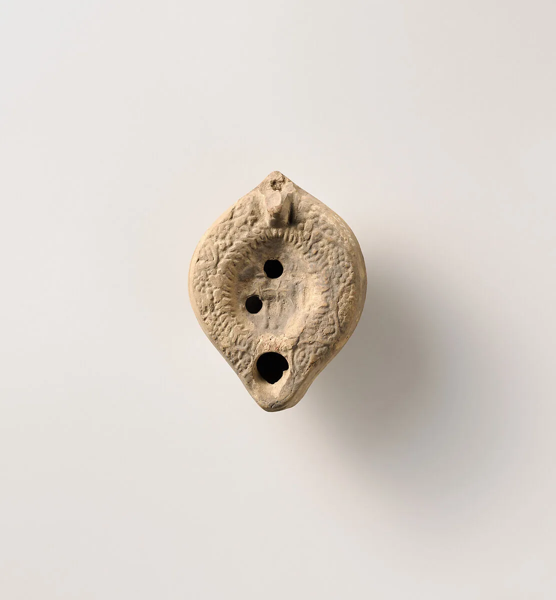 Terracotta oil lamp — Unknown