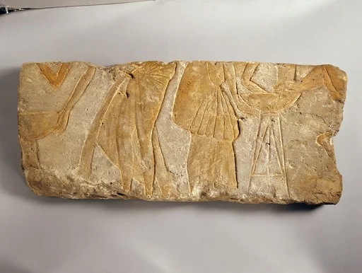 Relief with people setting down braziers