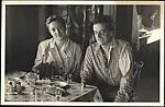 [Unidentified Man and Woman Seated at Table]