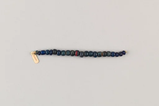 String of 22 elongated disc beads