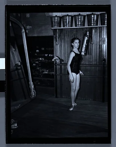 [Ballet Theatre Dancer Practicing at Barre, Metropolitan Opera House, New York City]