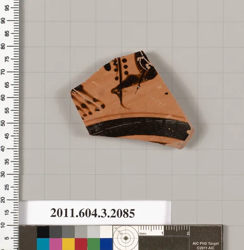 Terracotta fragment of a kylix (drinking cup)