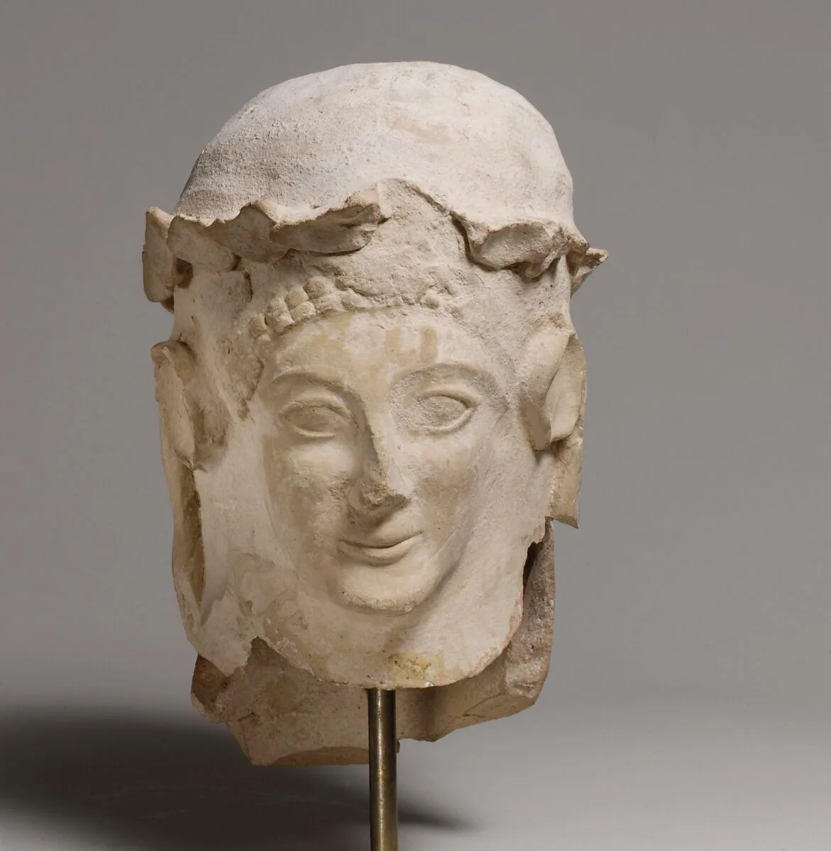 Terracotta head with wreath — Unknown