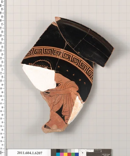 Terracotta fragment of a kylix (drinking cup)