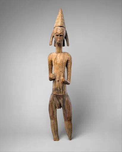 Male Figure Holding Animal Horn