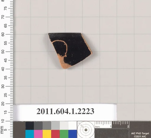 Terracotta rim fragment of a kylix (drinking cup)