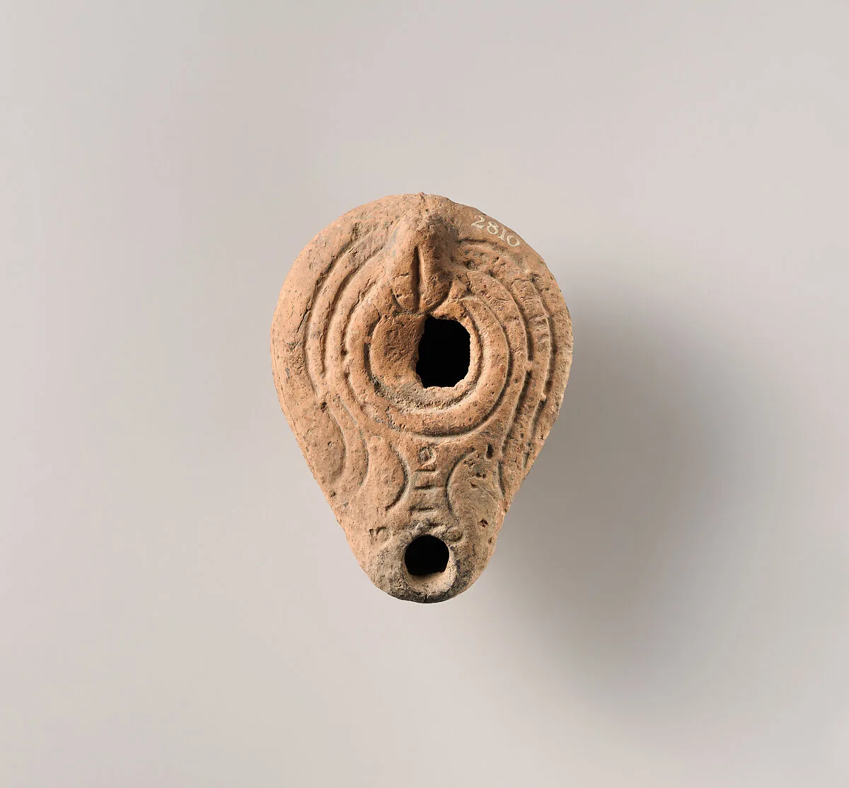 Terracotta oil lamp — Unknown