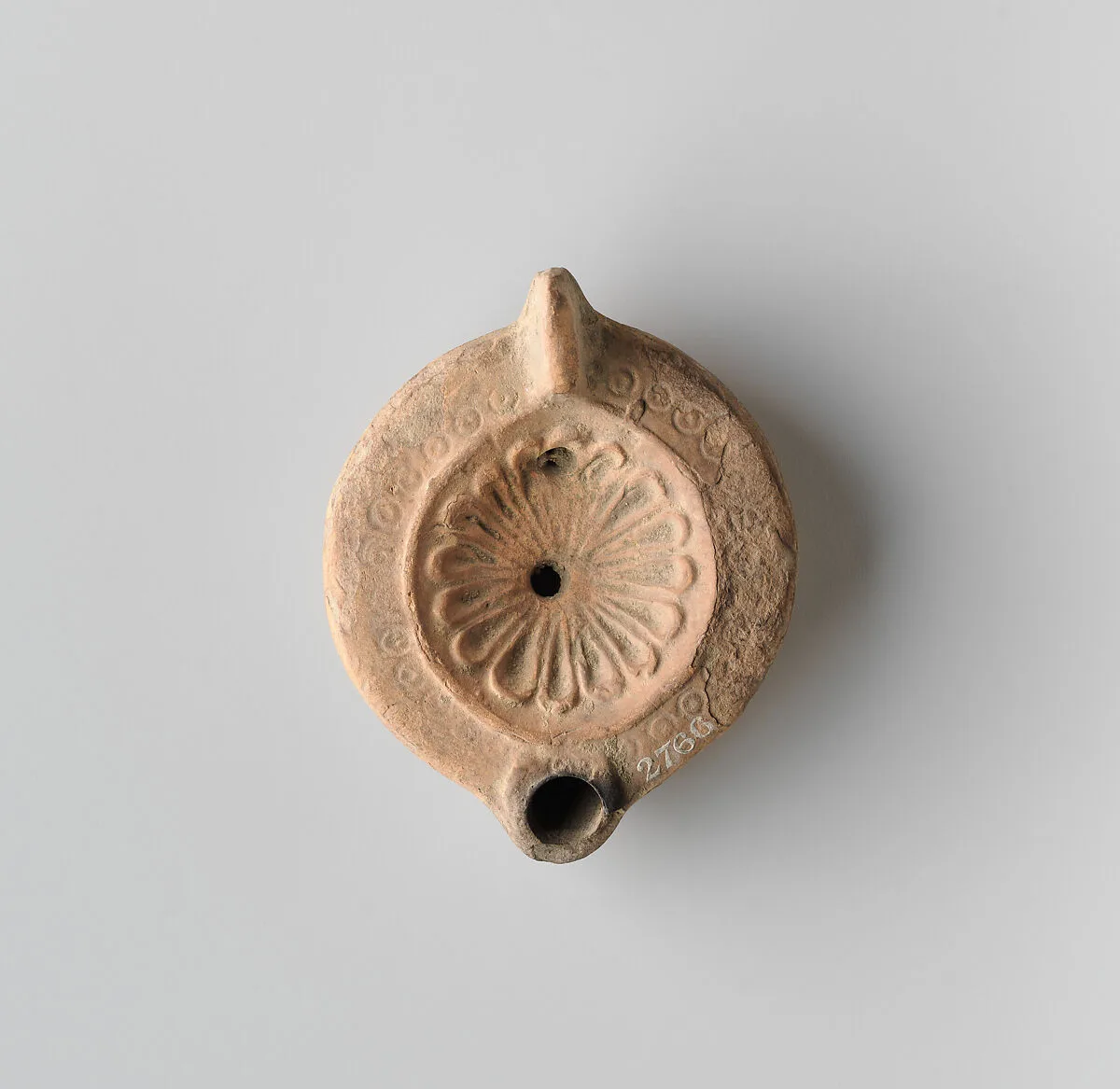 Terracotta oil lamp — Unknown