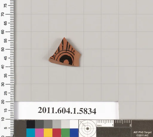 Terracotta fragment of a kylix: eye-cup (drinking cup)