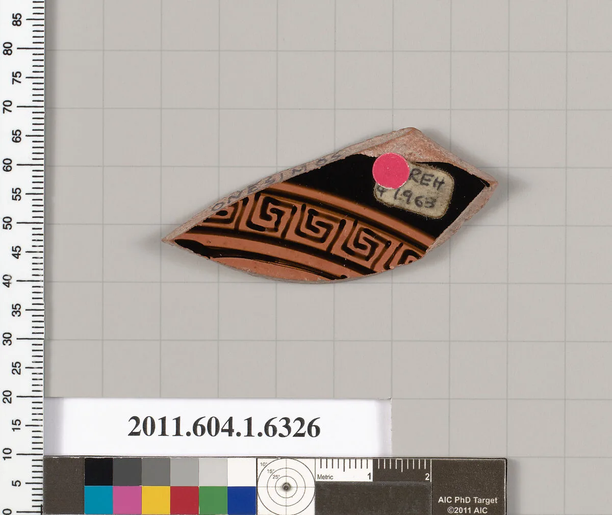 Terracotta fragment of a kylix (drinking cup) — Onesimos