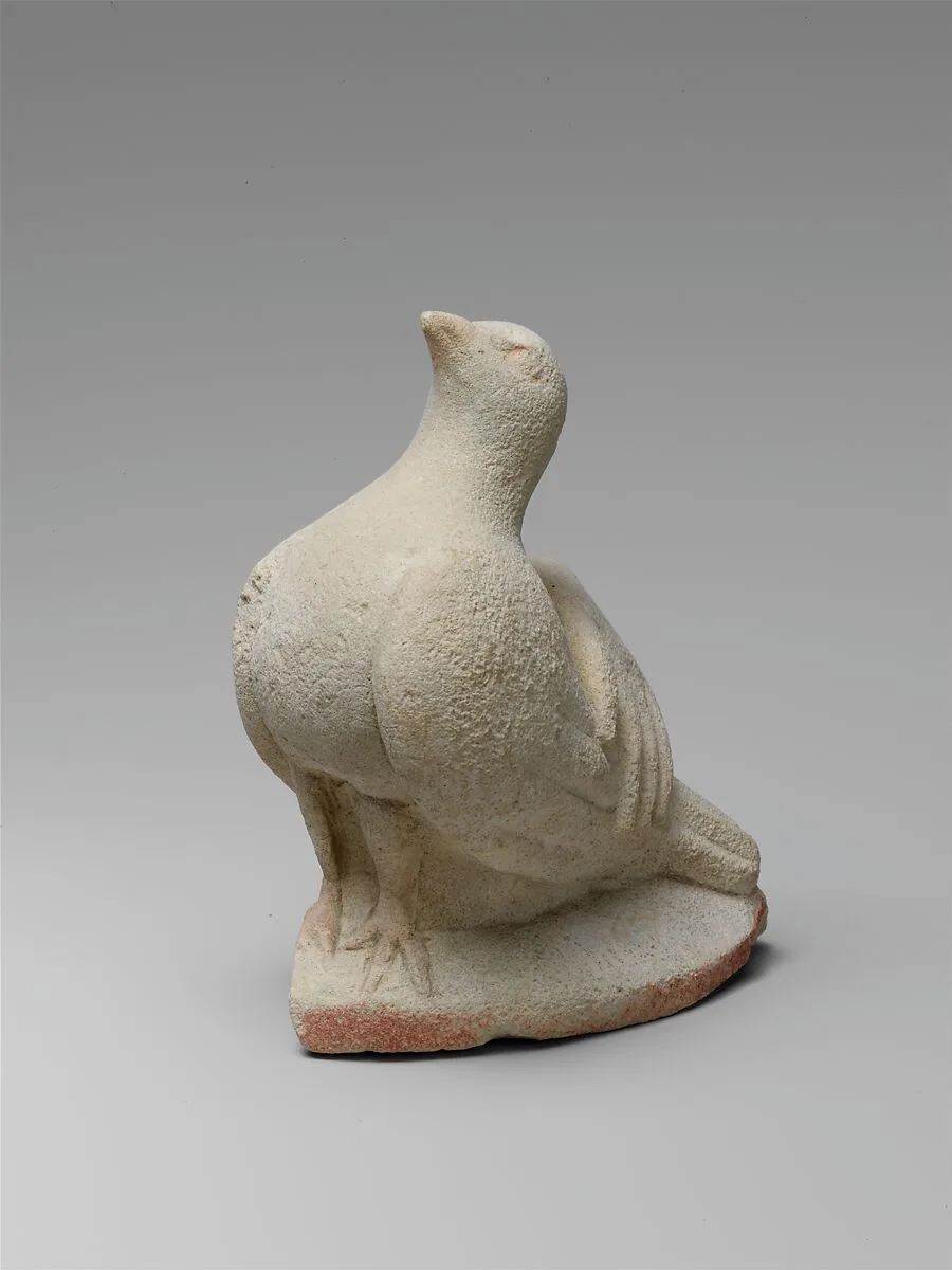 Limestone statue fragment of a left hand resting on a dove — Unknown