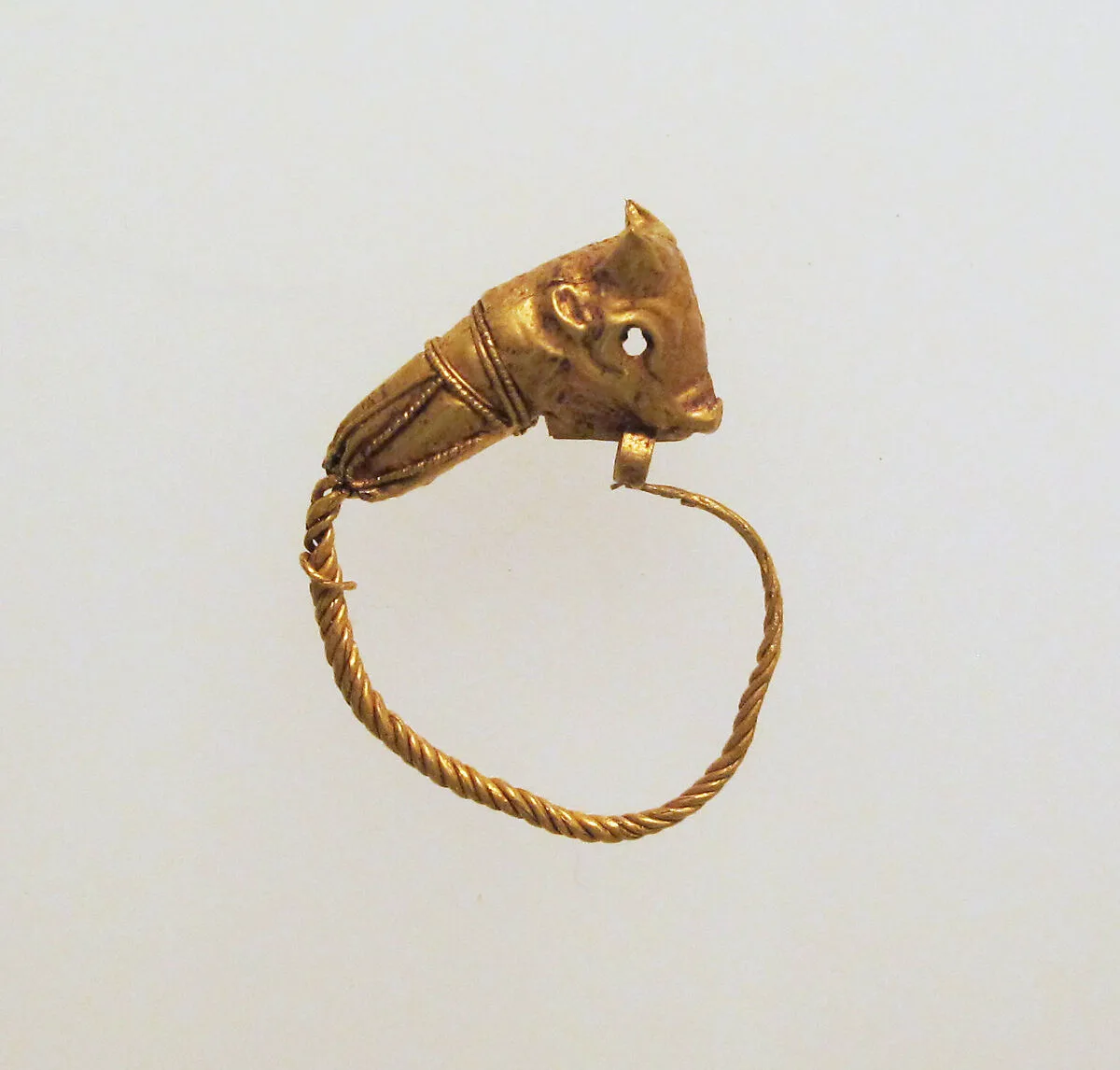 Gold earring with head of a bull — Unknown