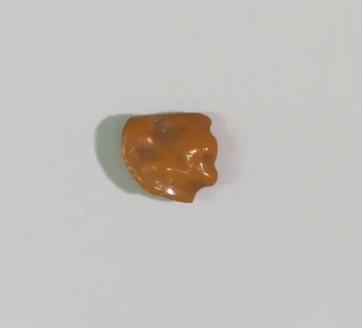 Inlay element from shrine: lion head