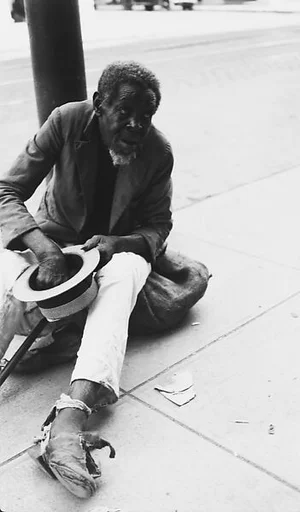 [Beggar Seated on Street, Havana]