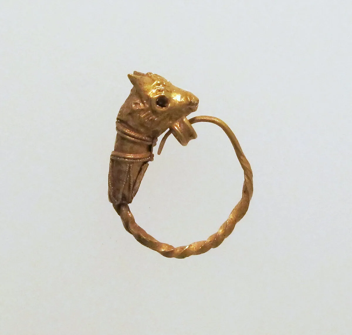 Gold earring with head of a bull — Unknown