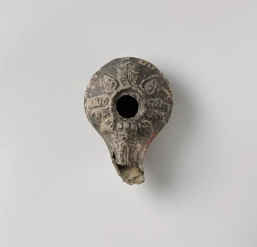 Terracotta oil lamp