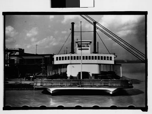 [Ferryboat "Algiers" at Dock with Parked Cars on Deck, New Orleans, Louisiana]