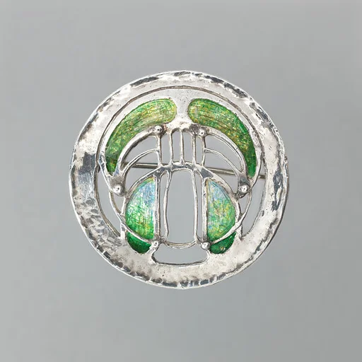 Round brooch with green enamel