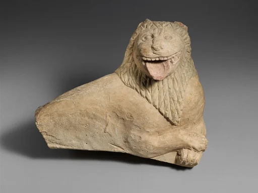 Fragment of a limestone funerary stele with a recumbent lion