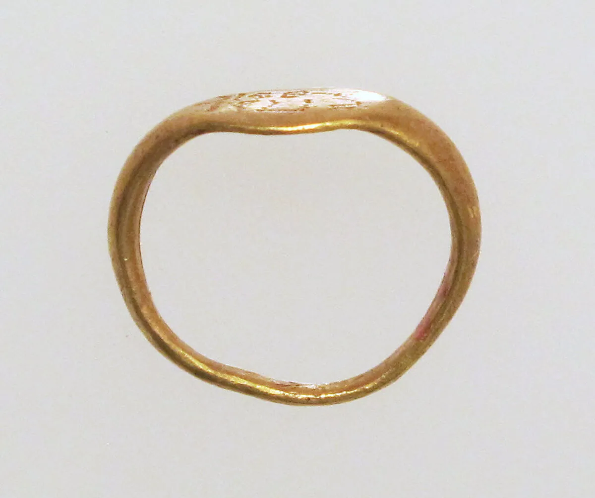 Gold ring with inscribed bezel — Unknown
