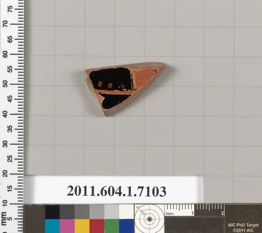 Terracotta fragment of a kylix (drinking cup)