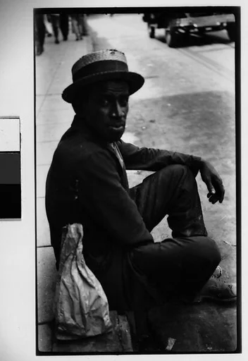 [Man Wearing Boater Seated on Ground, Havana]