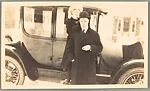 [Jane Beach Evans and Ralph Crane Standing Before Car]