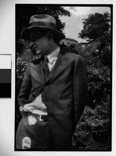 [Hanns Skolle in Suit and Hat, Before Hillside]