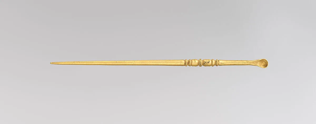 Gold ear pick — Unknown
