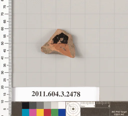 Terracotta fragment of a kylix (drinking cup)