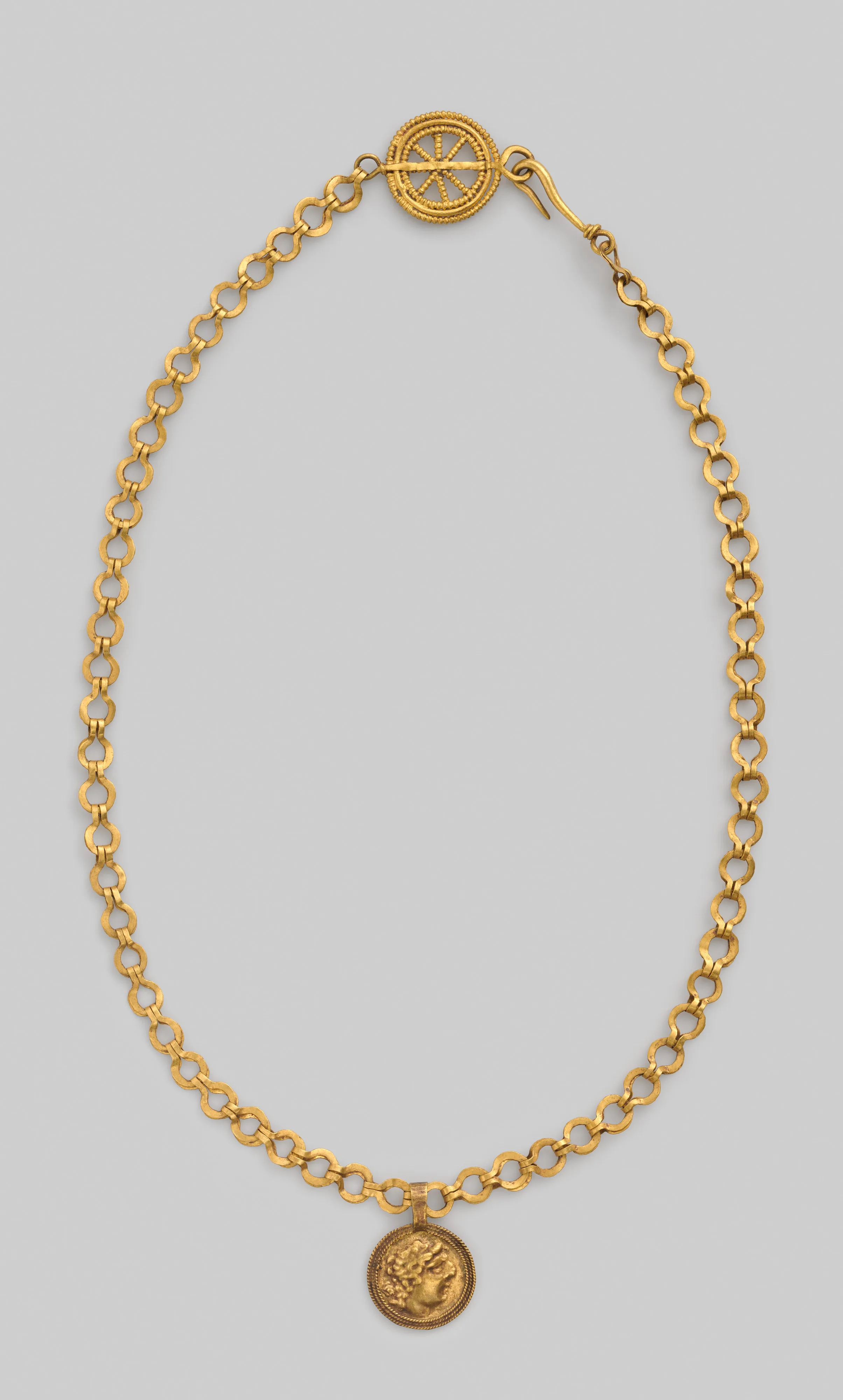 Necklace with a beaded wire wheel and a pendant with a profile of Alexander (?) — Unknown