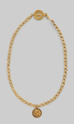 Necklace with a beaded wire wheel and a pendant with a profile of Alexander (?)