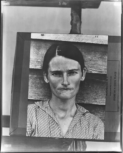 [Copy of Print of "Alabama Cotton Tenant Farmer Wife" (Allie Mae Burroughs) on Makeshift Easel]