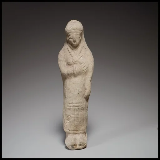 Standing female figurine
