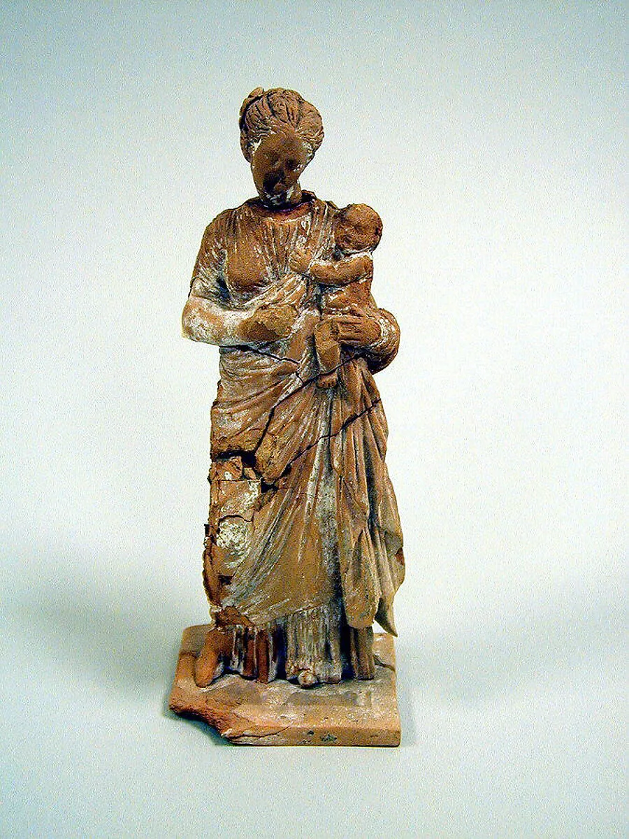 Statuette of a woman with infant — Unknown