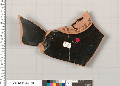 Terracotta fragment of a kylix (drinking cup)