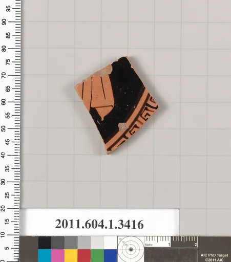 Terracotta fragment of a kylix (drinking cup)